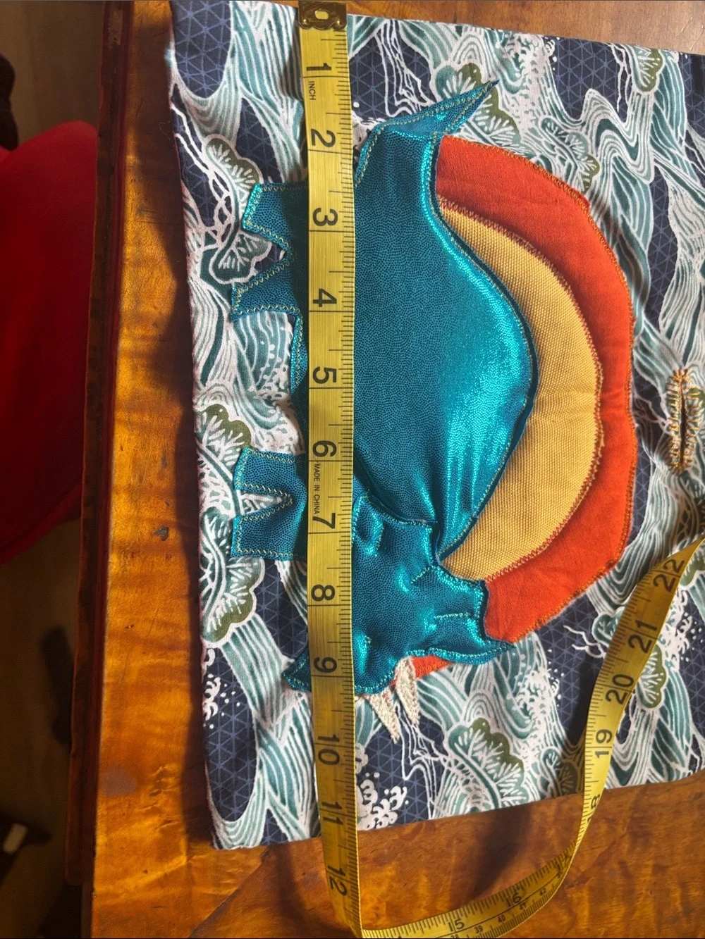 Teal Metallic Dinosaur Appliqué Cloth with Orange & Yellow Sun